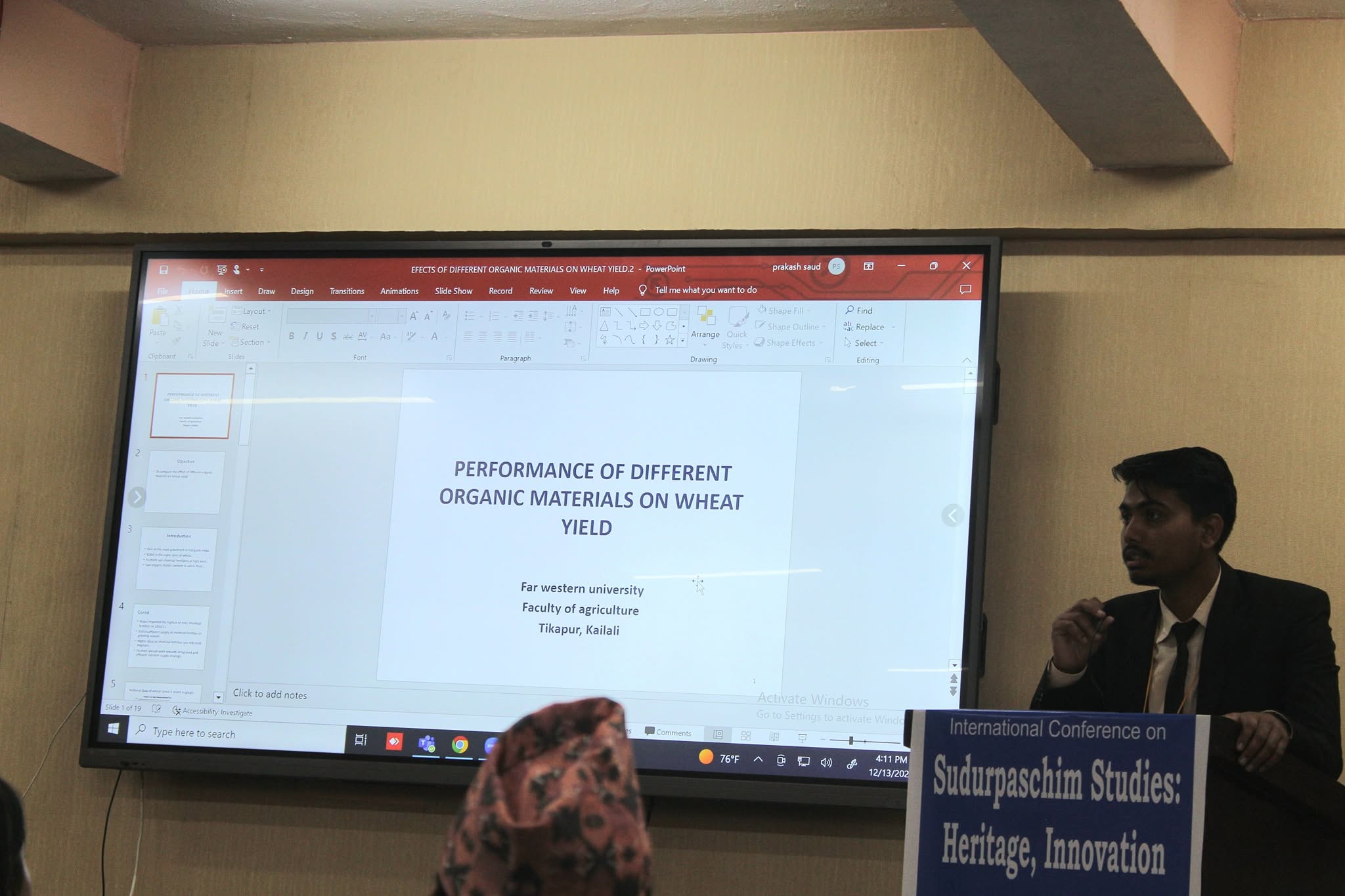 Saurab presenting research on organic fertilizers and wheat yield at a conference
